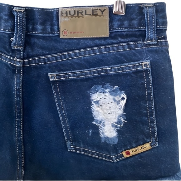 Shop the Trend: Women's Junior Size 7 Dark Denim Ripped & Frayed Hurley Shorts - Picture 3 of 3